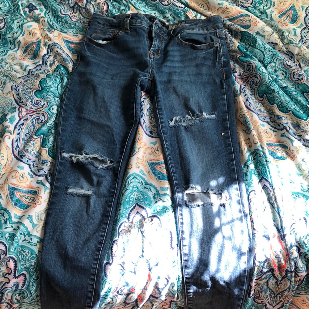 Ripped blue jeans